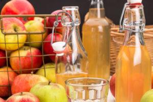 Apple juice for the winter obtained from a juicer: tips, recipes, description